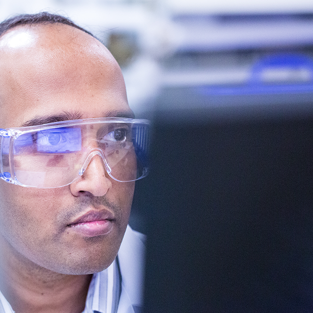 Scientist working at a computer